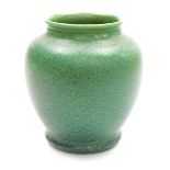 A Pilkington Royal Lancastrian pottery vase, of circular form with a flared rim, mottle green glaze,