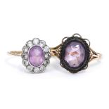 An amethyst and white sapphire ring, set in yellow metal, stamped 9ct, size Q/R, oval cut amethyst r