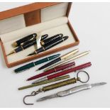 A group of fountain and ball point pens, to include a pair of Jinhao fountain pens, in green cases w