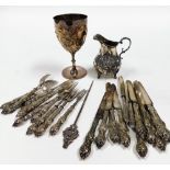 A group of plated wares, to include a goblet with embossed floral and cartouche decoration, 19cm hig