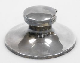 An Edward VII silver capstan inkwell, of loaded plain form, Birmingham 1909, 12.5cm diameter.