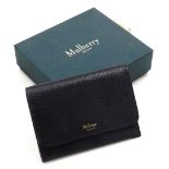 A Mulberry black grained leather coin and key pouch, 13cm wide, boxed.