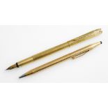 A Mont Blanc fountain pen, in gold coloured casing, the nib marked 585, and a Cross ball point pen,