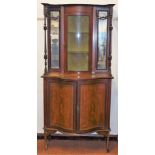 A Victorian mahogany, satinwood cross banded and marquetry inlaid display cabinet, the top with a co