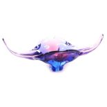 A Murano style glass dish, of petallated form, in purple and blue, 47cm wide.