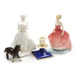 A group of porcelain, comprising a Royal Doulton figure Summer's Day, HN3378, a Royal Doulton A Wint