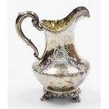 A Victorian silver cream jug, of baluster form, the body with etched flower and scroll decoration an