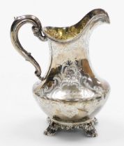 A Victorian silver cream jug, of baluster form, the body with etched flower and scroll decoration an