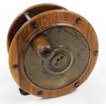 A P.D. Malloch Perth brass and lignum salmon fly fishing reel, 11cm diameter,