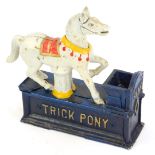 A vintage novelty cast Trick Pony money box, on a blue ground, 18cm high.