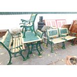 A pine and wrought iron garden furniture set, comprising a three seater bench and four single chair