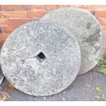 Two millstones, 65cm diameter.