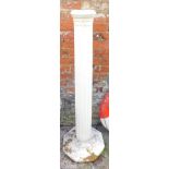 A reconstituted stone column, cream painted on octagonal base, 136cm high.