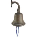 A brass bell, with wall mounting fitting, 21cm high.