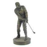 A Genesis (P S) limited edition cold cast figure of a golfer, numbered 6/2500, 24cm high.