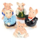 A set of five Wade Natwest piggy banks, comprising a family of father, mother, son, daughter and bab