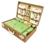 A Brexton picnic set, with fitted interior to include ceramics, printed with exotic islands, etc. (A