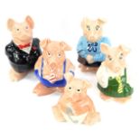 A set of five Wade Natwest piggy banks, comprising a family of father, mother, son, daughter and bab