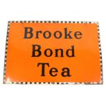 A Brooke Bond Tea enamel advertising sign, on orange ground with chequered border, 51cm x 76cm.