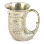 A Western Germany BMF pewter tankard, of horn shape and cast with panel of deers, 12.5cm high.