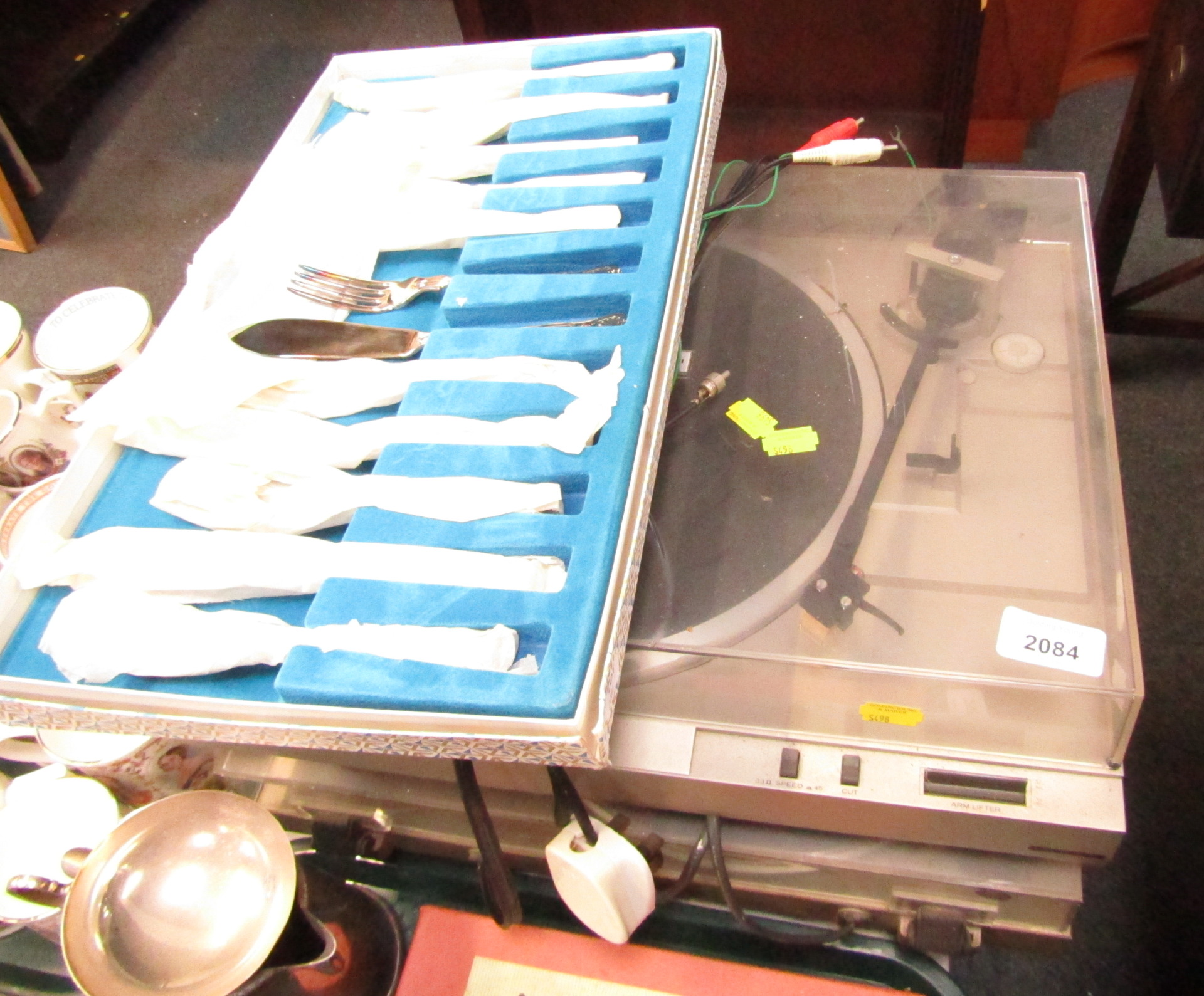 Two Hitachi record players and a case of boxed cutlery. (3)