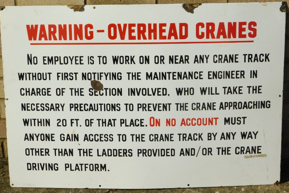 A warning overhead cranes sign, in red and black on white ground 65cm x 90cm