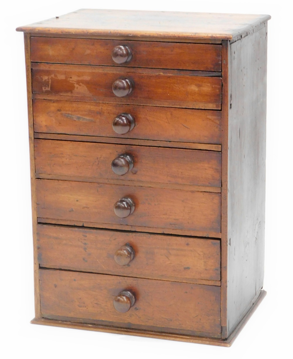 A 19thC mahogany and pine collectors chest, comprising six graduated drawers, each with turned wood
