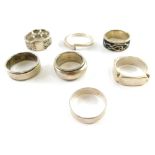 Seven silver and other dress rings, comprising woven design, enamel set wedding bands, etc., all sta