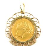 A Victorian half gold sovereign pendant, dated 1861, with scroll design pendant mount and loop, 6.3g