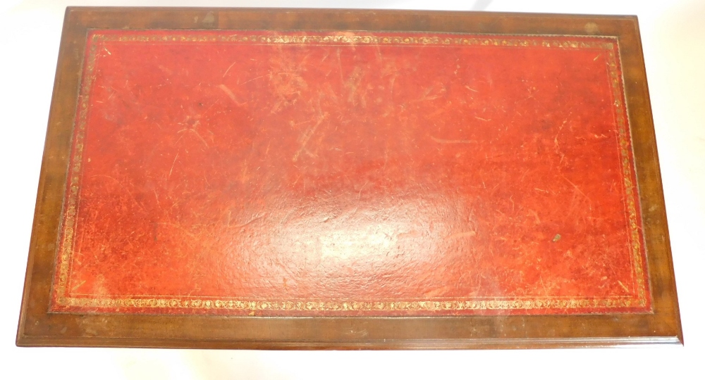 A mahogany writing table, the rectangular top with a red leather insert, above two frieze drawers, o - Image 2 of 2
