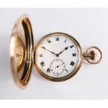 A 9ct gold hunter pocket watch, the 4cm Roman numeric dial with a subsidiary Arabic second hand, in