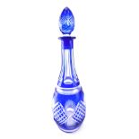 A Bohemian style blue flash decanter and stopper, 37cm high.
