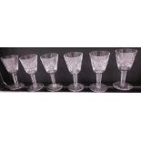 A set of six Waterford Crystal sherry glasses, each with a partially hobnail cut bell shaped bowl on