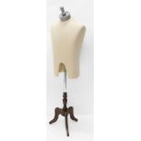 A tailor's mannequin torso, with head mount, on cylindrical stem and triple cabriole legs, 162cm hig