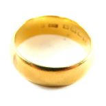 An 18ct gold thick wedding band, of plain design, ring size Y, 11.3g.