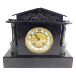 A Victorian architectural design slate mantel clock, the 11cm diameter Arabic dial flanked by turne