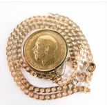 A George V gold full sovereign, 1912, in 9ct gold mount, attached to a slender link necklace marked