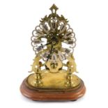 A brass skeleton clock, with 14cm wide flowerhead Roman numeric dial, fronting a single fusee moveme