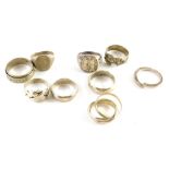 Eight silver and other dress rings, comprising signet rings, puzzle rings, crossover rings, etc., al