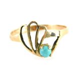 A turquoise dress ring, of central band design, with single turquoise yellow metal stamped 9ct, ring