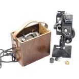 A vintage Kodascope model G series II projector, in fitted case, 43cm high, with accessories.