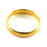 A 22ct gold wedding band, of plain design, ring size J½, 3.6g.