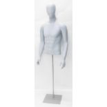 A plastic tailor's mannequin, with head and torso, on turned stem and square base, 172cm high.