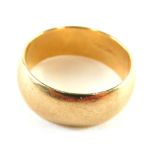 A 9ct gold wedding band, of thick design, ring size W, 8.1g.