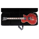 A Fernandes Monterey electric guitar, six string, in wine red, no. FG04031765, 59cm long, in Kinsman