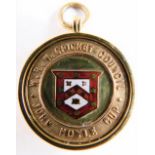 A 9ct gold and enamel cricket medal, centred with a shield and raised W. R. W. Cricket Council John