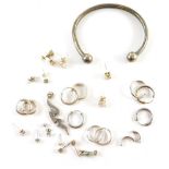 A group of silver and other jewellery, comprising hoop earrings, bangles, pendants, etc., some stone
