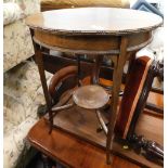 An Edwardian mahogany window table