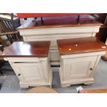 A chest of three drawers and two pedestal cabinets partially painted cream.