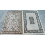 Two machine woven rugs. (230 x 160cm, and 230 x 158cm)